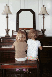 two-girls-at-piano